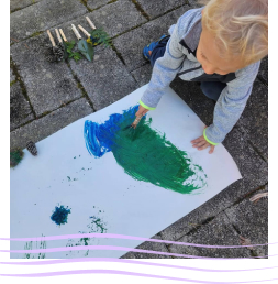 Preschooler creating art